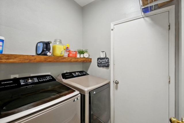 laundry area featuring laundry area and separate washer and dryer