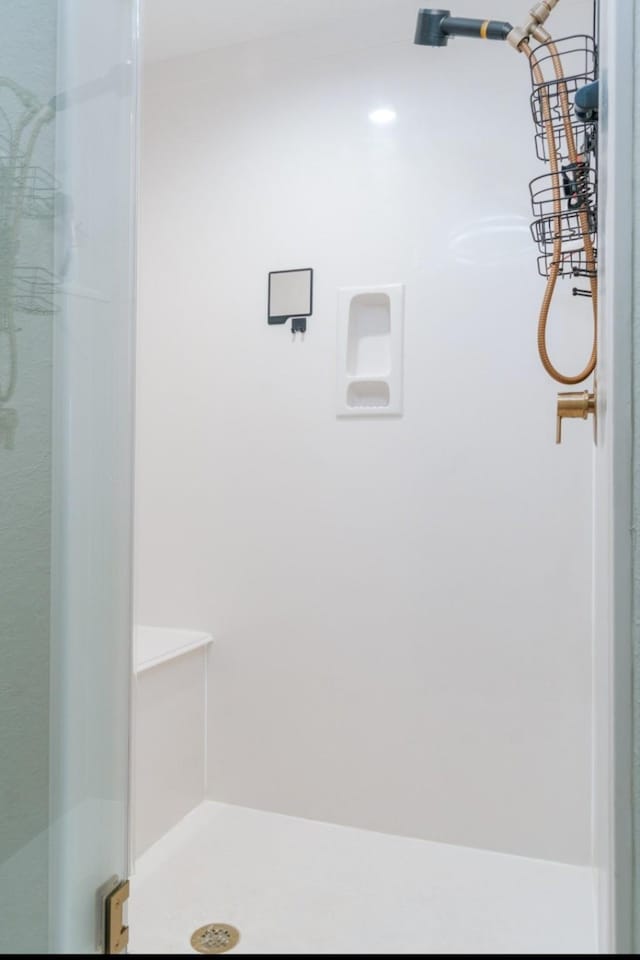 full bath featuring a stall shower