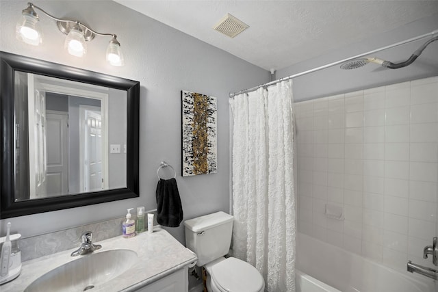 bathroom featuring visible vents, toilet, vanity, a textured ceiling, and shower / bath combination with curtain