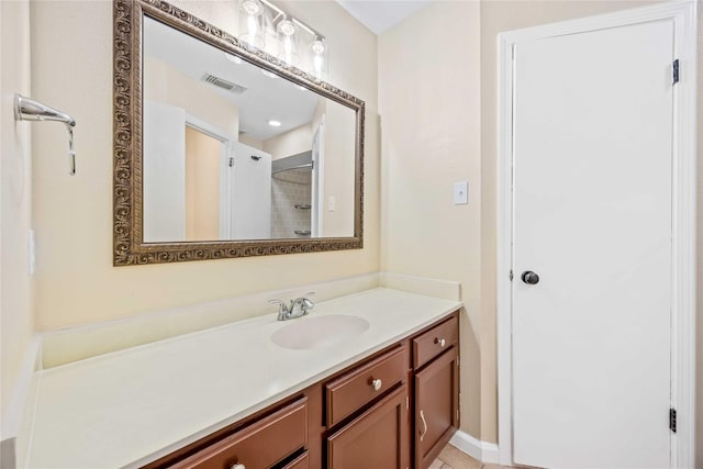 bathroom with visible vents and vanity