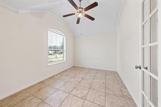 unfurnished room featuring ornamental molding, lofted ceiling, and light tile patterned floors