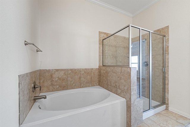 bathroom with a stall shower, tile patterned flooring, a garden tub, and crown molding