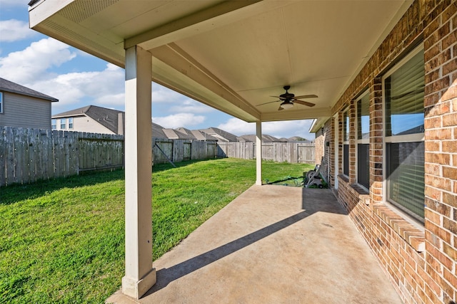 view of patio / terrace with a fenced backyard and a ceiling fan