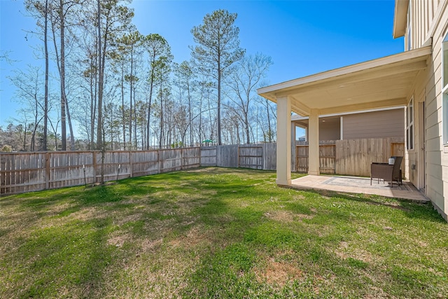 view of yard with a patio and a fenced backyard