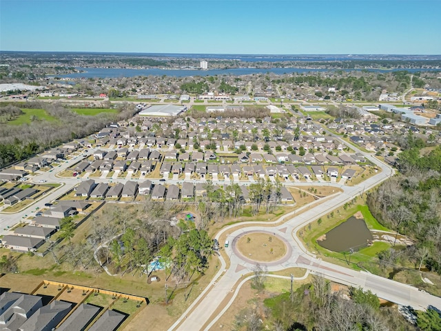 birds eye view of property with a residential view