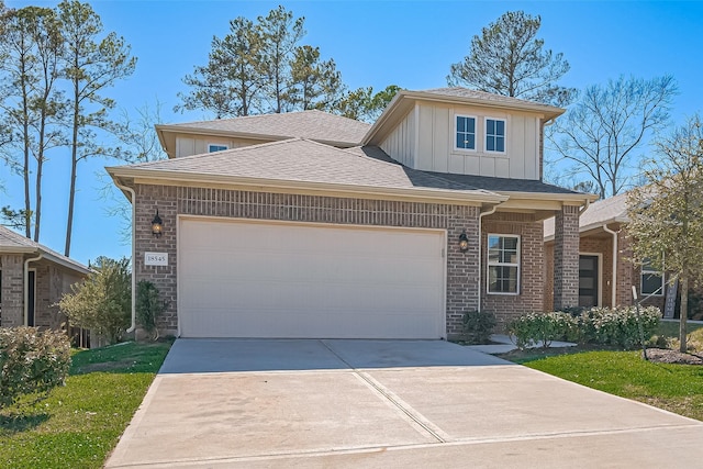 view of front facade featuring a shingled roof, concrete driveway, a garage, board and batten siding, and brick siding