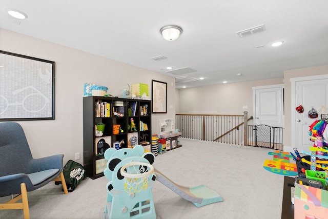 rec room featuring carpet, visible vents, and recessed lighting