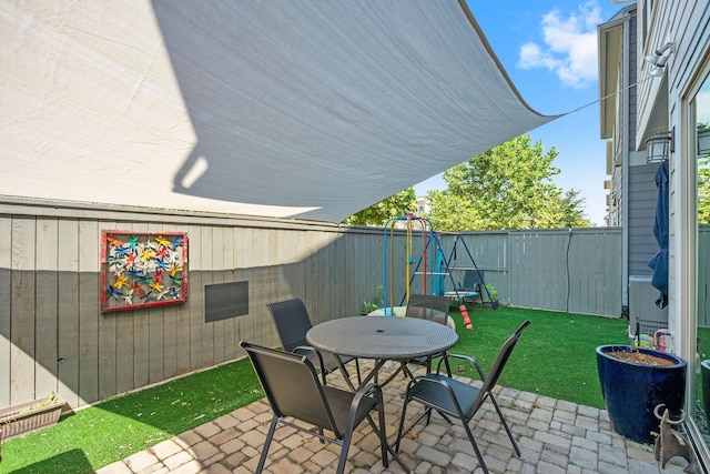 view of patio / terrace featuring a fenced backyard and outdoor dining space