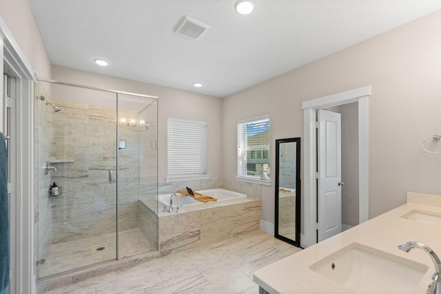 full bath with double vanity, a stall shower, visible vents, a bath, and a sink