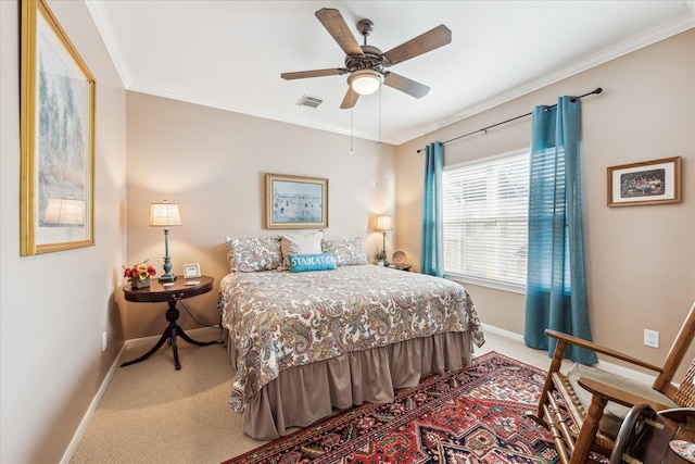 bedroom featuring carpet floors, visible vents, crown molding, and baseboards