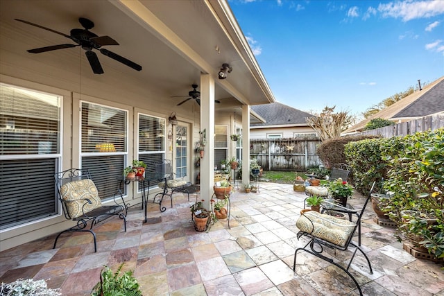 view of patio featuring ceiling fan and a fenced backyard