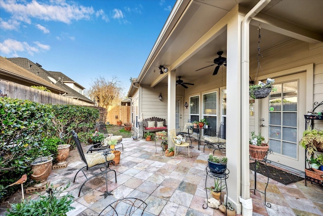 view of patio with a ceiling fan and a fenced backyard