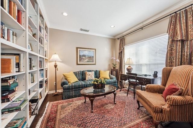 living area featuring crown molding, recessed lighting, visible vents, wood finished floors, and baseboards