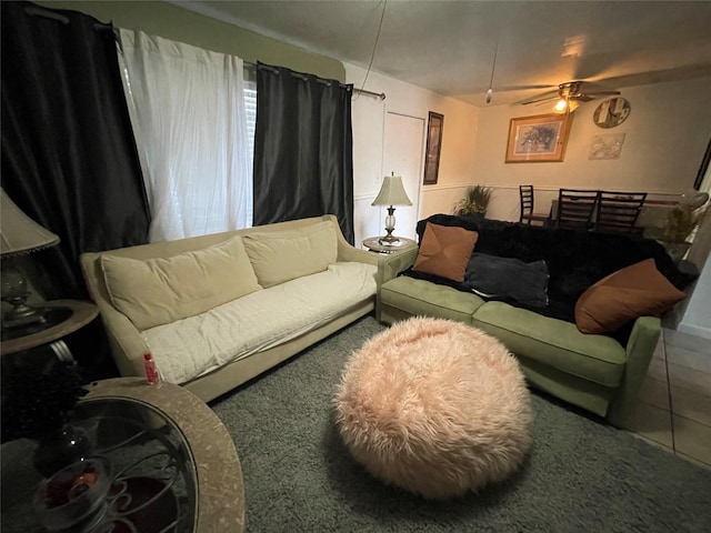 living room featuring a ceiling fan