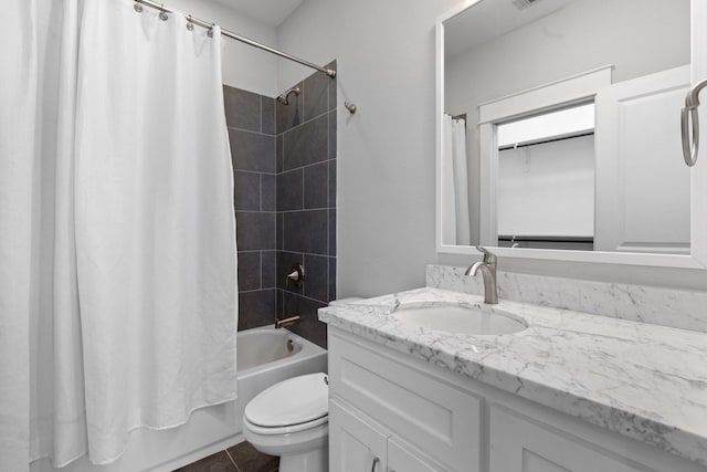 full bathroom featuring shower / tub combo with curtain, visible vents, toilet, vanity, and tile patterned floors