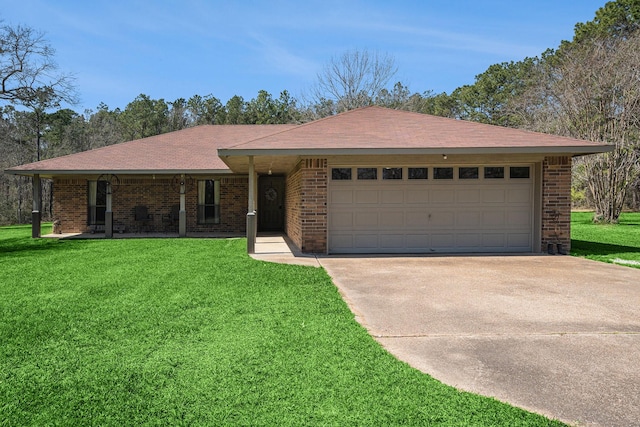 ranch-style house with a front lawn, concrete driveway, brick siding, and an attached garage