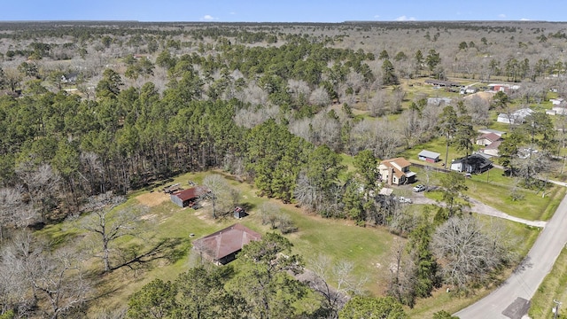 bird's eye view featuring a forest view