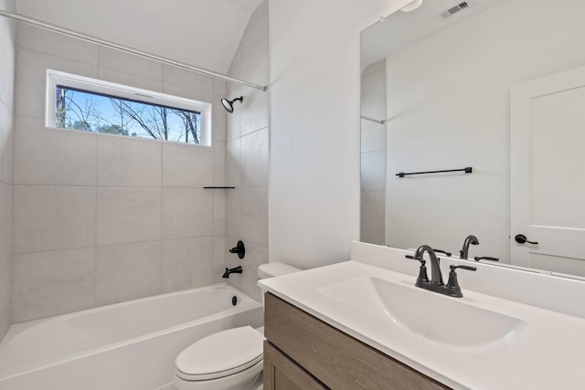 full bathroom with toilet,  shower combination, vanity, and visible vents