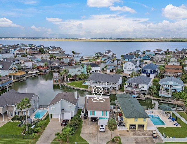 1114 Tiki Dr, Galveston, TX 77554 - bird's eye view featuring a residential view and a water view