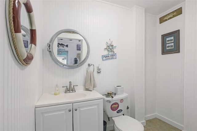 bathroom with toilet and vanity