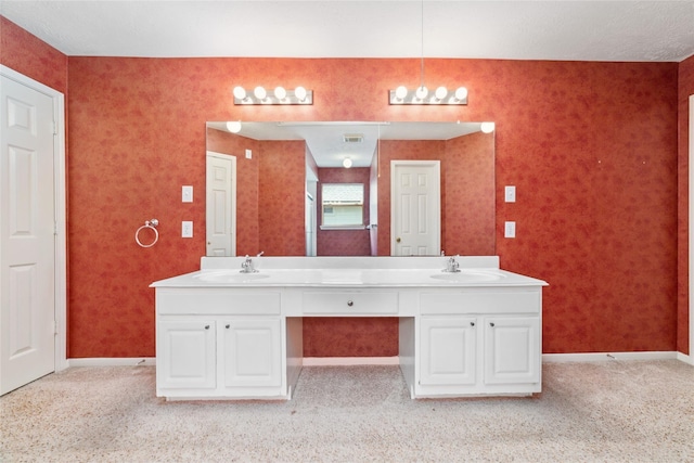 full bathroom with double vanity, baseboards, visible vents, carpet, and a sink