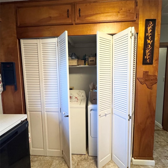 laundry room featuring washer and dryer and laundry area