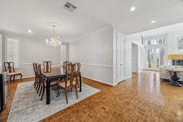 dining space with a notable chandelier, recessed lighting, visible vents, ornamental molding, and baseboards