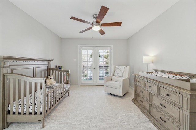 bedroom with baseboards, a ceiling fan, light colored carpet, access to exterior, and french doors