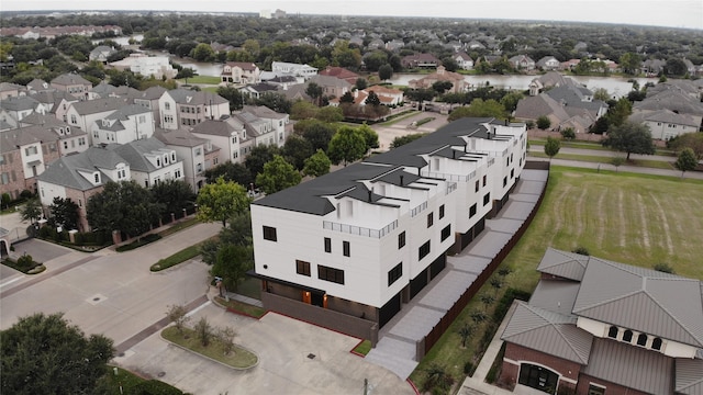 aerial view with a water view and a residential view