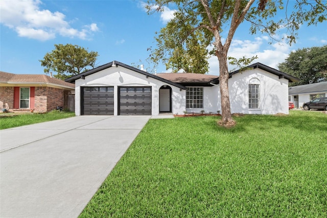 ranch-style house with a garage, concrete driveway, brick siding, and a front lawn