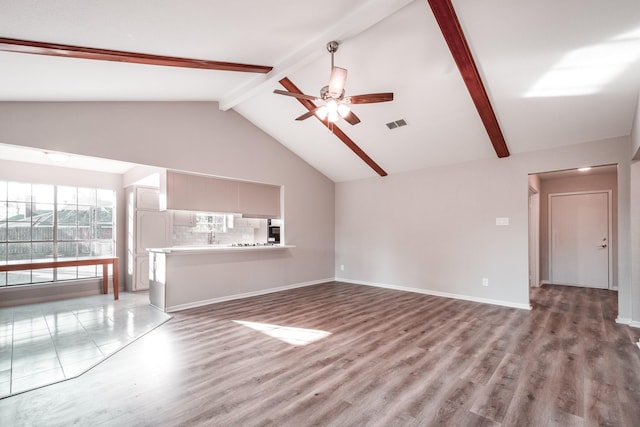 20650 S Hillcrest Dr, Porter, TX 77365 - unfurnished living room with a ceiling fan, wood finished floors, and baseboards