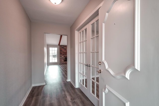 20650 S Hillcrest Dr, Porter, TX 77365 - hallway with dark wood-type flooring and baseboards