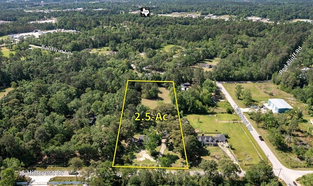20650 S Hillcrest Dr, Porter, TX 77365 - aerial view of property's location featuring a heavily wooded area and property boundaries highlighted