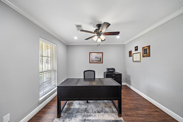 home office featuring crown molding, dark wood-type flooring, visible vents, and baseboards