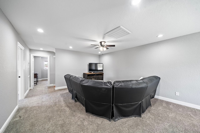 carpeted living area featuring a ceiling fan, recessed lighting, visible vents, and baseboards