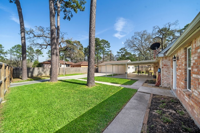 view of yard featuring a patio area and a fenced backyard