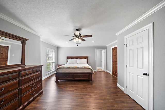 19210 Lockridge Dr, Spring, TX 77373 - bedroom with a ceiling fan, ornamental molding, baseboards, a textured ceiling, and dark wood-style flooring