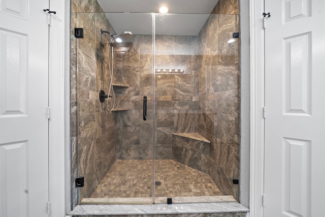 bathroom featuring a stall shower