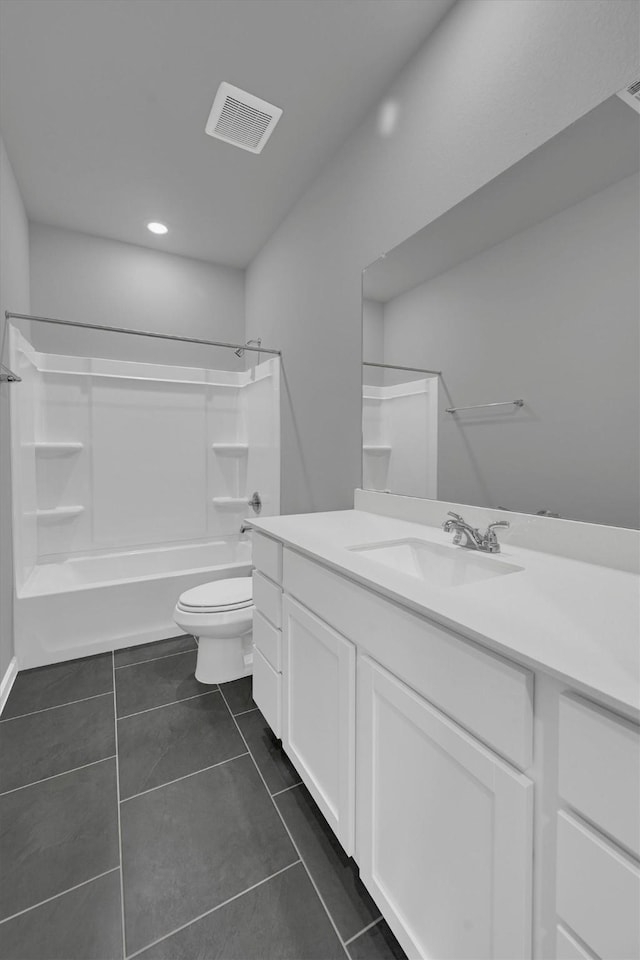 715 Whispering Winds Dr, Beasley, TX 77417 - bathroom with vanity, toilet, tub / shower combination, tile patterned floors, and recessed lighting
