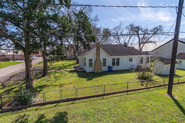 view of front of house with fence private yard and a front yard