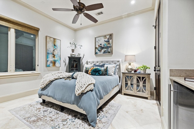 bedroom with a ceiling fan, baseboards, visible vents, and crown molding