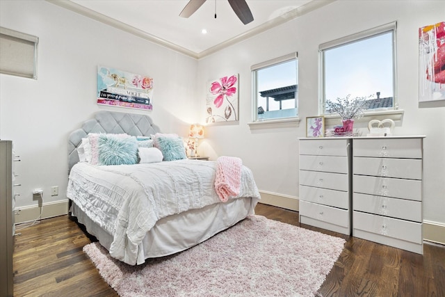 bedroom featuring ornamental molding, recessed lighting, baseboards, and wood finished floors