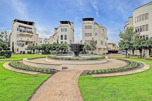 view of home's community featuring a yard