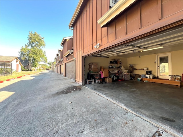 exterior space featuring a garage and board and batten siding