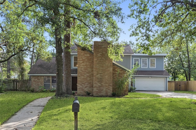 traditional-style house with a garage, concrete driveway, a chimney, and fence