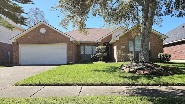 single story home with a front lawn, brick siding, driveway, and an attached garage