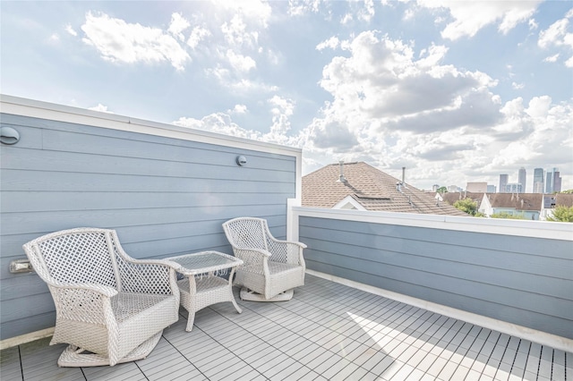 balcony featuring a city view