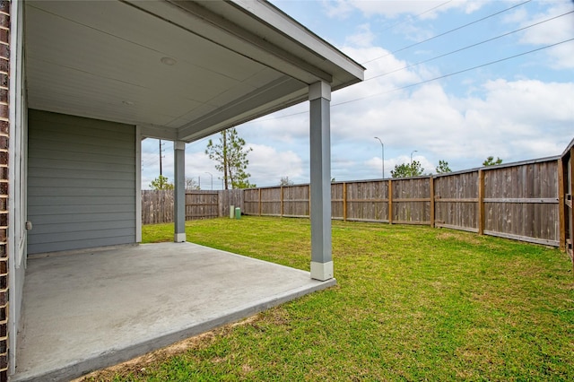 view of yard with a fenced backyard and a patio area