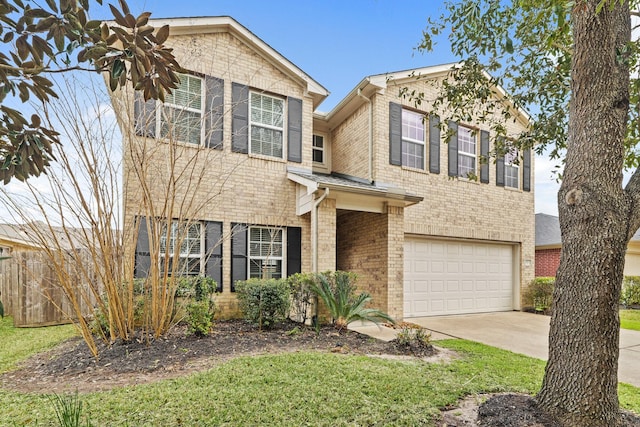 traditional home featuring driveway, brick siding, and an attached garage