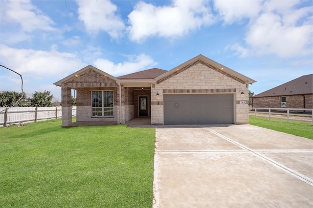 view of front of house featuring a garage, a front yard, concrete driveway, and fence